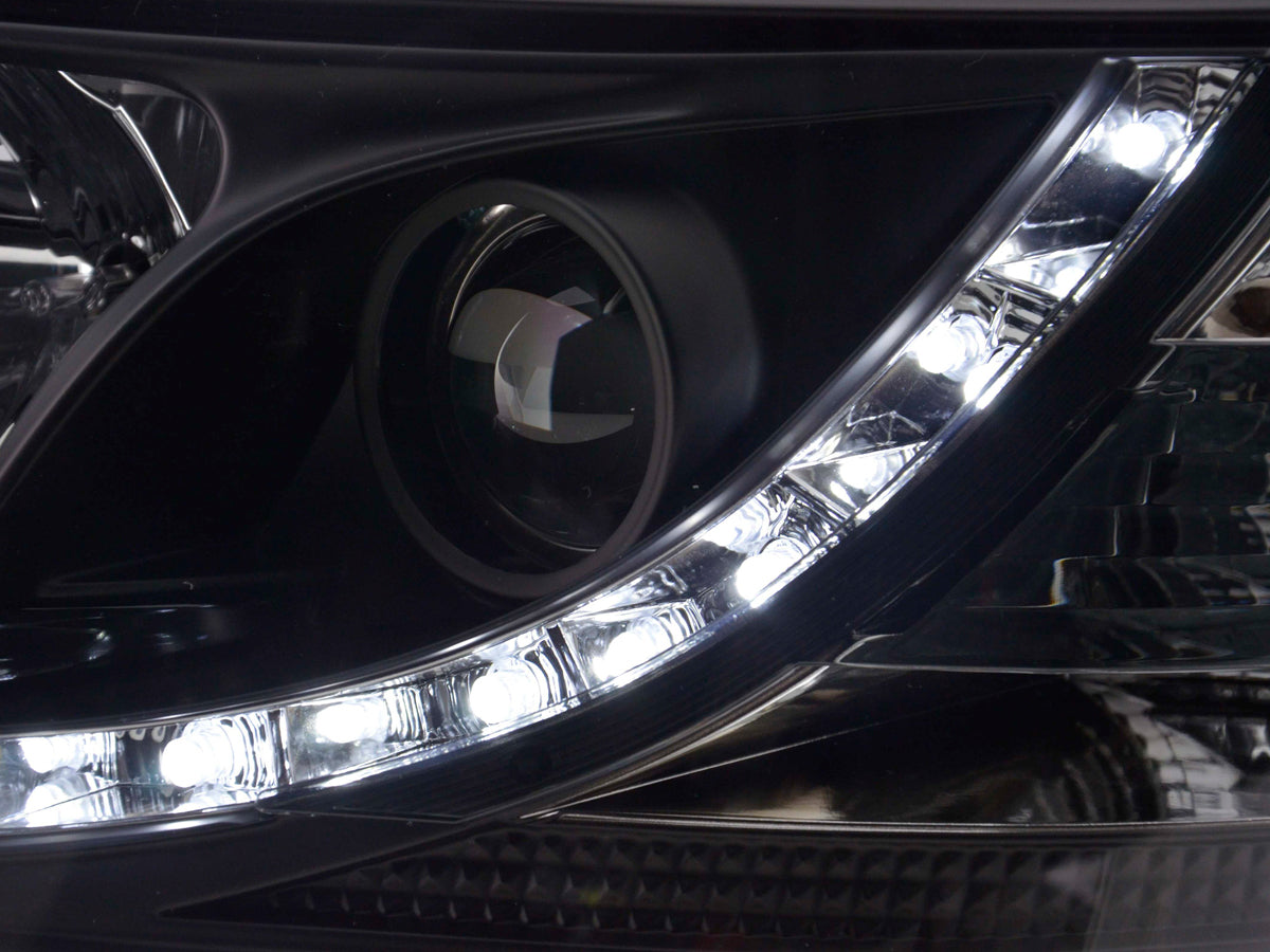 Scheinwerfer Set Daylight LED Tagfahrlicht VW Bus T5 03-09 schwarz Scheinwerfer Set Daylight LED Tagfahrlicht VW Bus T5 03-09 schwarz
